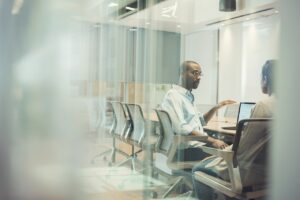 People in office setting having a business related conversation. 