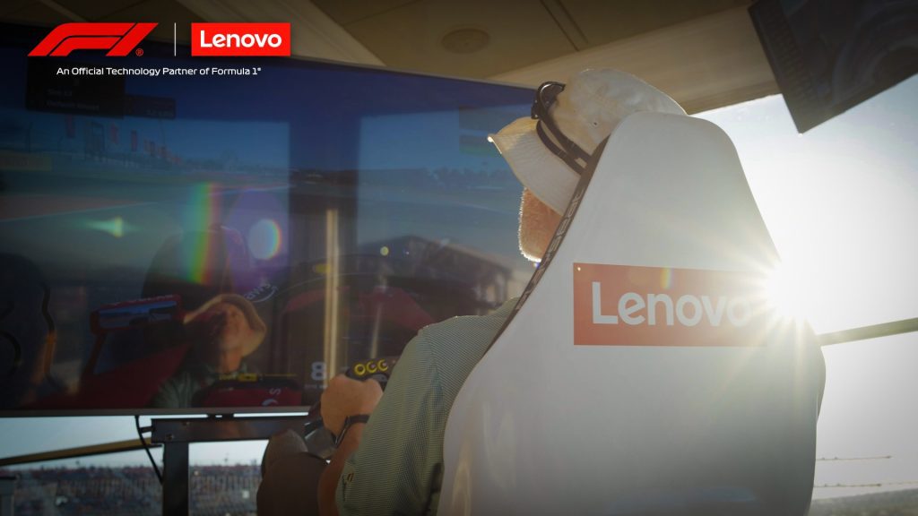 F1 and Lenovo: Person sitting in a driving simulator