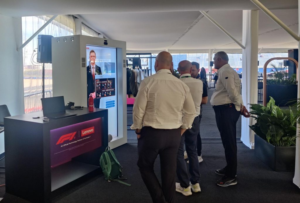 People interacting with the ThinkEdge avatar