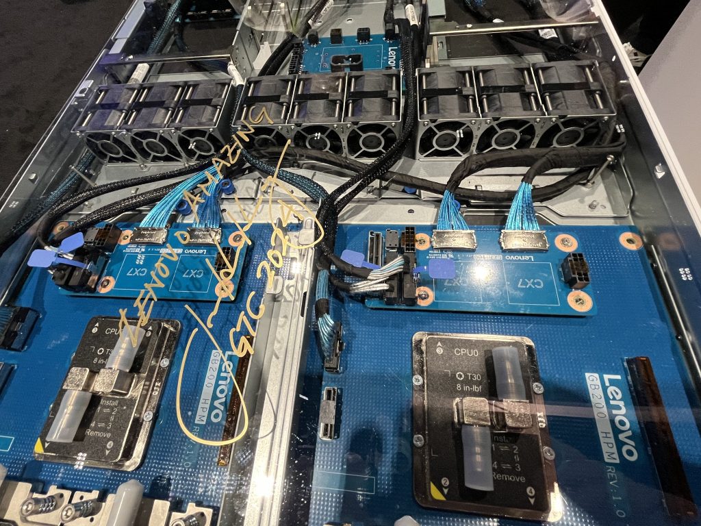 NVIDIA CEO Jensen Huang stopped by the Lenovo booth at GTC24 to sign the first-ever GB200 NVL72 System.