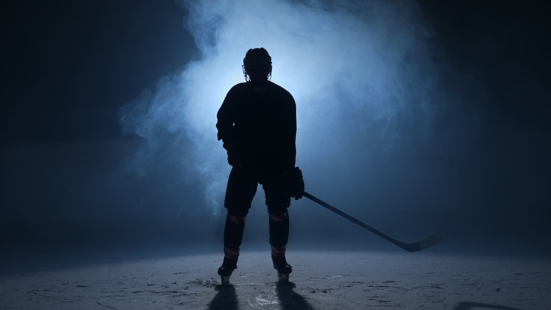 Carolina Hurricanes player, backlit on the ice